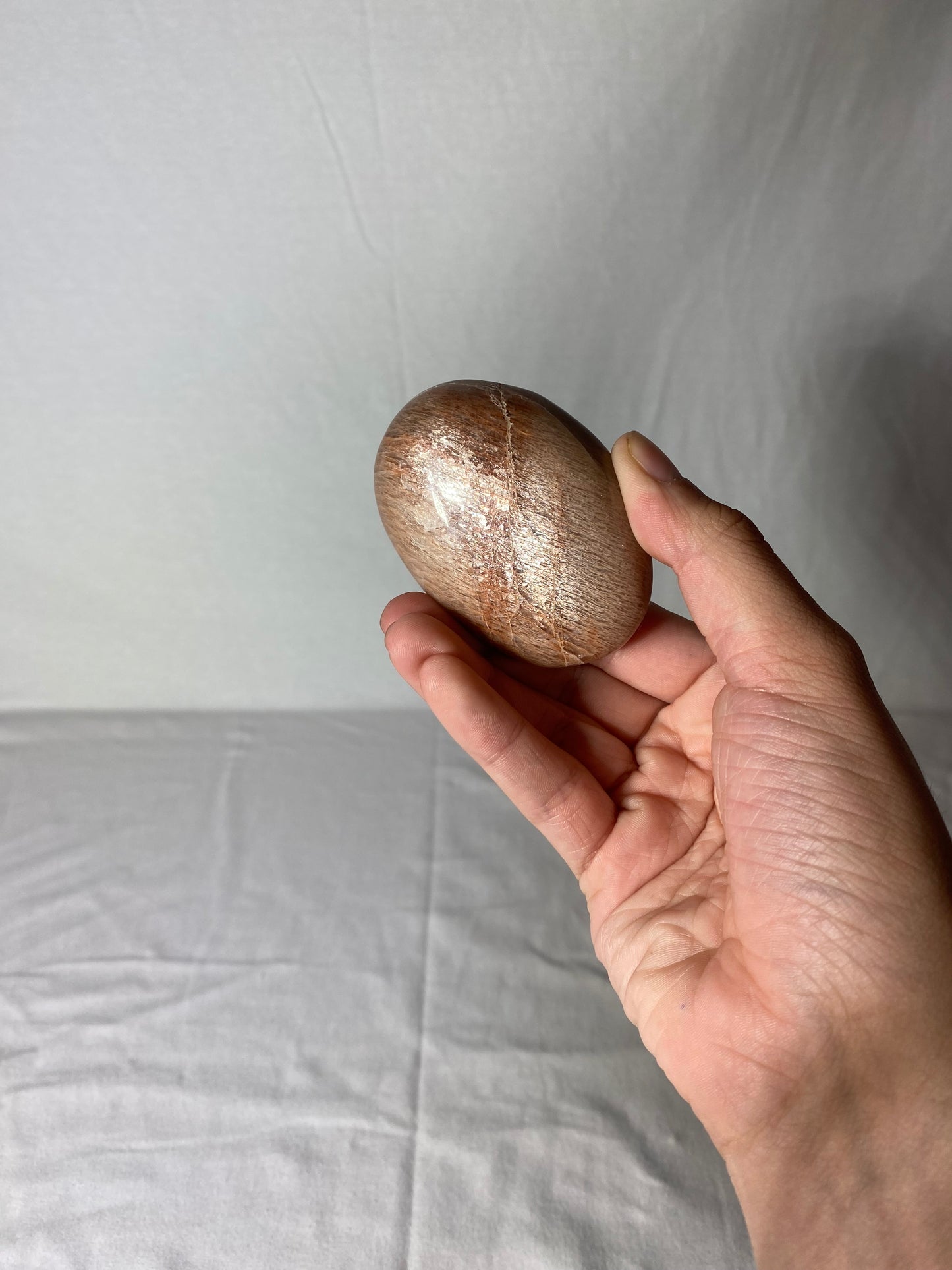 Madagascan Polished Sunstone Palm Stone (C)