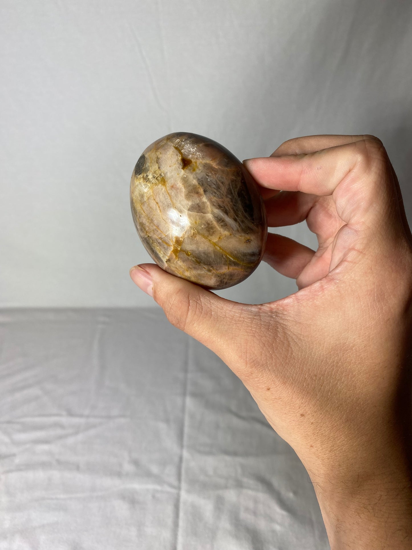 Madagascan Polished Sunstone Palm Stone (E)