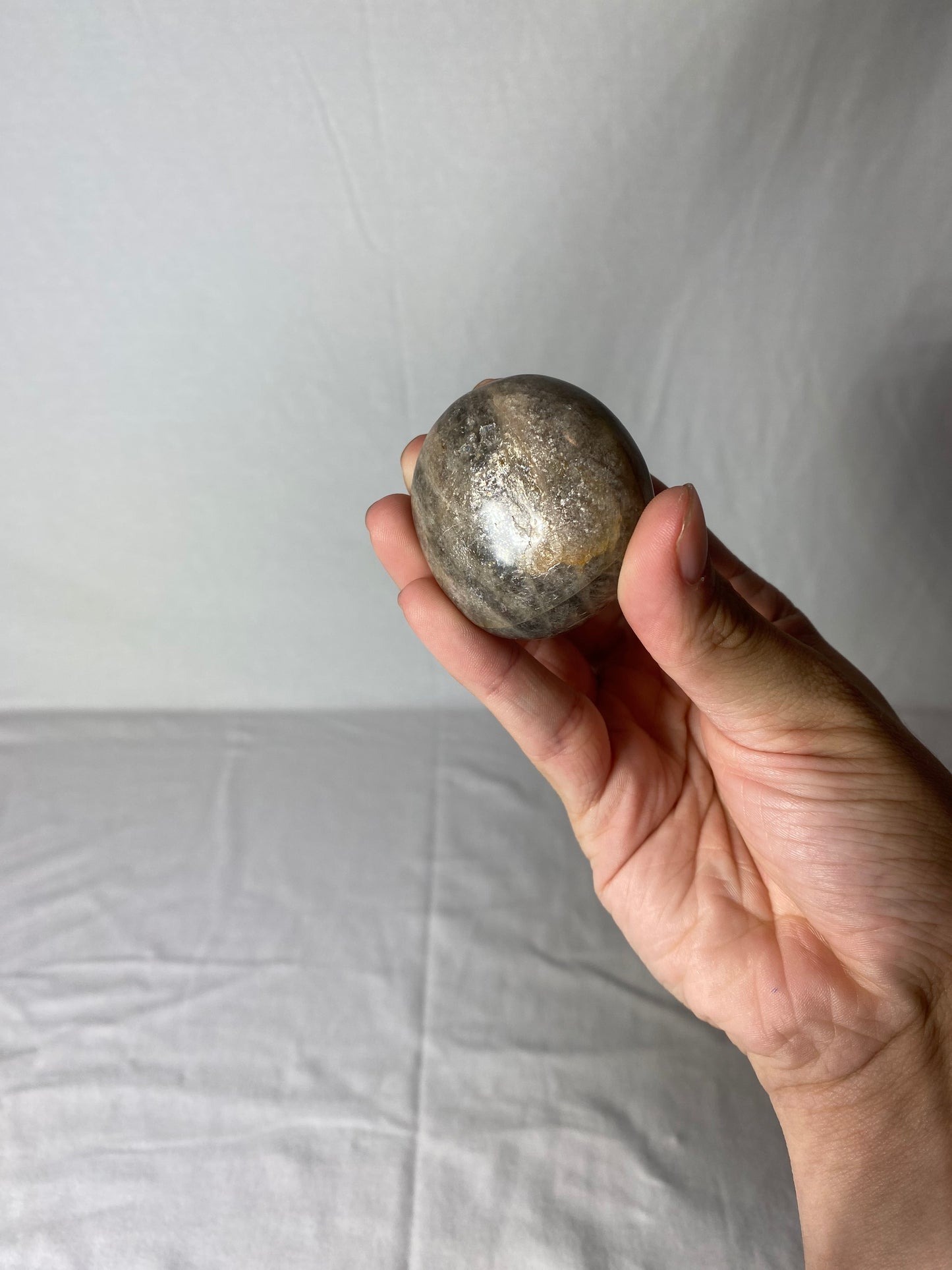 Madagascan Polished Sunstone Palm Stone (F)