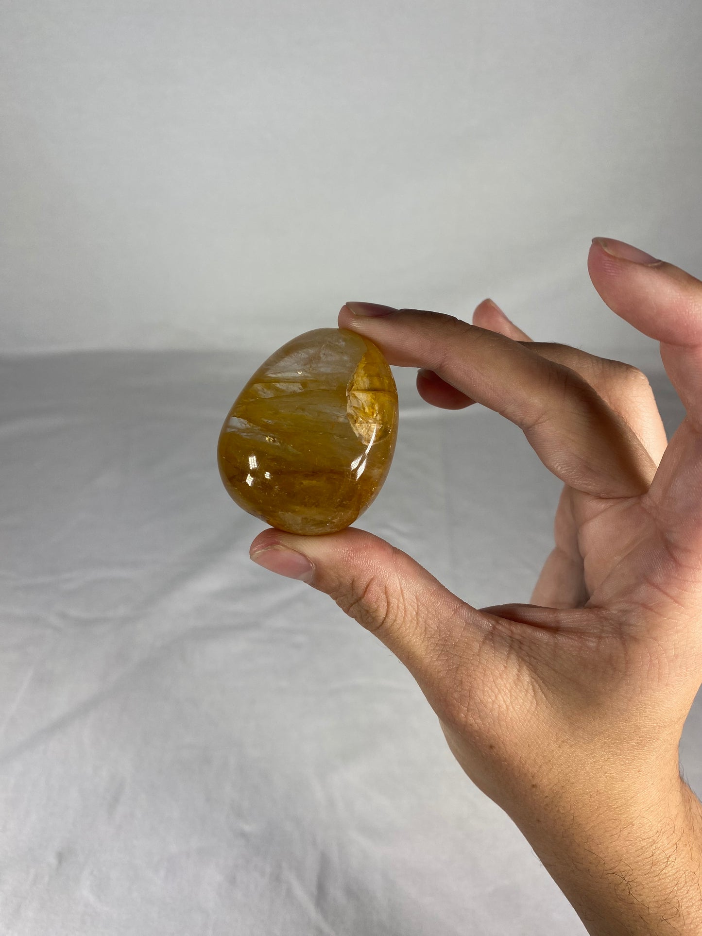 Madagascan Polished Golden Healer Quartz Palm Stone (B)