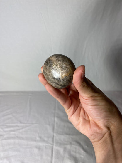 Madagascan Polished Sunstone Palm Stone (F)