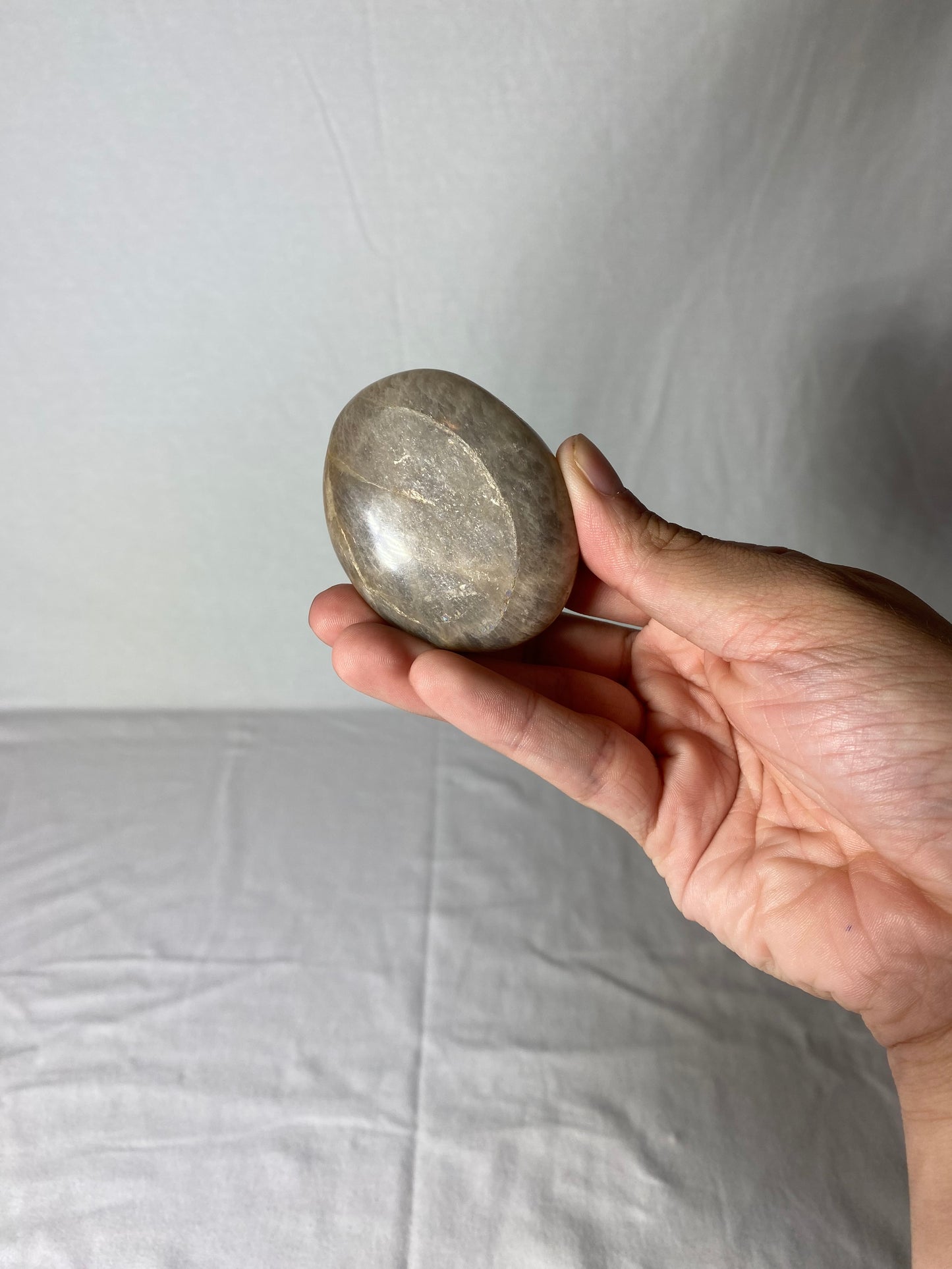 Madagascan Polished Sunstone Palm Stone (A)
