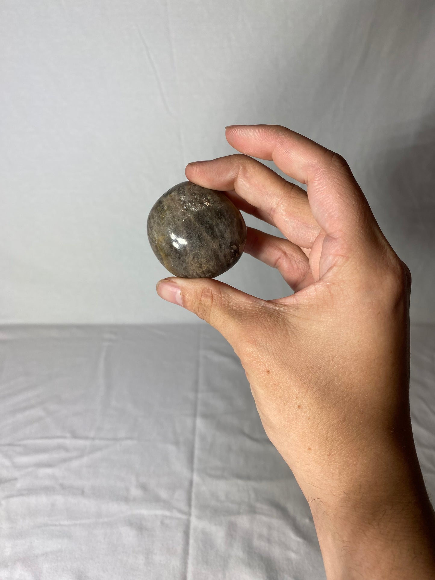 Madagascan Polished Sunstone Palm Stone (F)